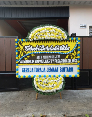 Papan Bunga Duka di Meral